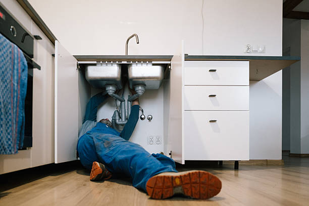 Professional Plumbing technician working in Norwood, MA